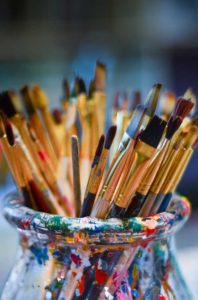 Paint brushes in jar